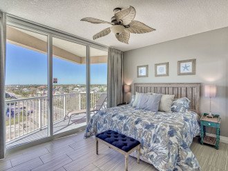 Guest bedroom with king bed and gulf view with balcony