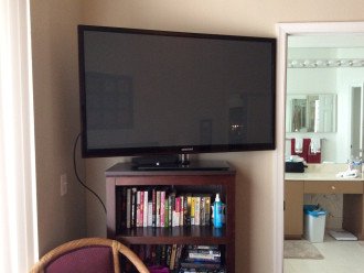 large screen TV, DVR, large number of books, movies, games, etc. available