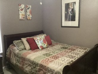 queen bed 3rd bedroom with fan and TV