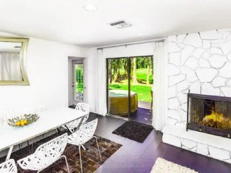 Dining area with fireplace.