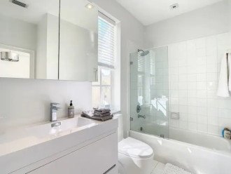 Spacious Bathroom with Shower and Bathtub