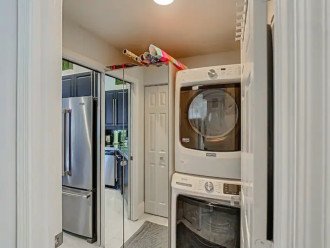 Top of the line laundry room with Maytag stackable machines