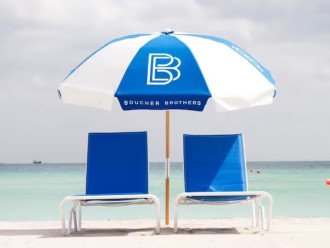Beach resort amenities available including beach chairs, umbrellas and canopy