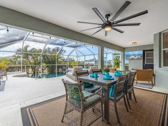 Enjoy canal views as well as the large lanai with heated pool! - Villa Demelo #1