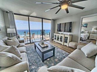Living room is spacious with an amazing view of the Gulf of Mexico and the lagoon pool