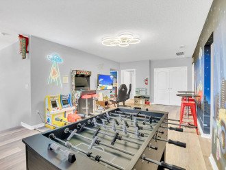 Pizza Planet themed game room. Enjoy 1000s of games on multiple game systems, including PS5.