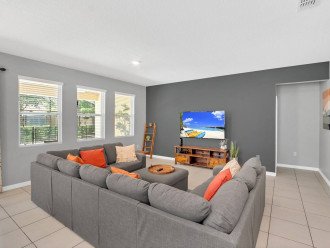 Living Room w/65" smart TV and ample seating