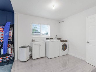Pack light and enjoy the convenience of our laundry room, complete with a washer and dryer, and even some beach gear like foldable chairs, making it easy to keep your clothes clean and enjoy a day of fun in the sun at the nearby beach. Includes AC