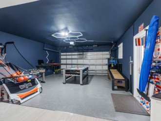 Bring on the fun with our game room that has it all - from an arcade basketball machine and air hockey to skee ball and 2 gaming computers - perfect for an unforgettable game night with family and friends.