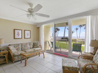 Living Area with patio overlooking Blue Wave Award Winning Deerfield Beach