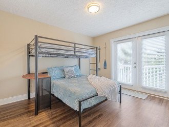 Bedroom 3 offers a Twin/ Full Bunk Bed with balcony access.