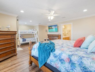 Master Bedroom offers a King Bed & Twin/Twin Bunk Bed.