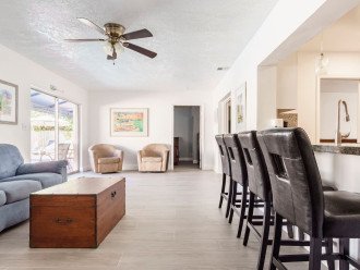 Florida room is the place to “chill”. It offers ceiling fan, breakfast bar, several seatingareas, and direct access to pool & patio. This spacious house offers plenty of quiet areas torelax, read or enjoy a cold beverage.