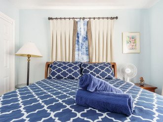 Bedroom #3 has a queen-size sleigh bed, closet, dresser and 40” smart TV. This bedroomhas direct access to pool & patio area via sliding glass door. This bedroom has access tobathroom #3, which has a bathtub and is central to the “Florida Room