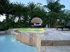 Amazing farm stay with beautiful heated pool and lush tropical landscape!