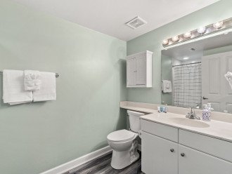 Bunk bathroom with walk-in shower
