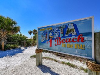 You are 1 block north of the access road to Siesta Key