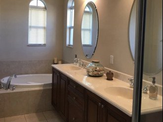 Master Bathroom duel sinks, Jacuzzi tub stall shower, private toilet room