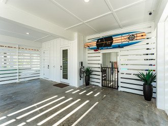 Carport: Font Door, EV Charger and Pool/Beach Storage Room