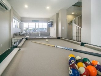 Enjoy a game of pool on the main entertainment level.