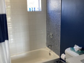 Tub with shower on main level bathroom