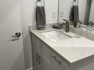 Second bath shared by bedroom 2/3 with tub/ shower combination
