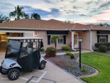 Beautiful layout, only 2 miles from Lake Sumter Square, and includes golf cart!