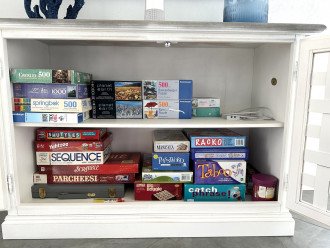 Game and puzzle storage in DR cabinet.