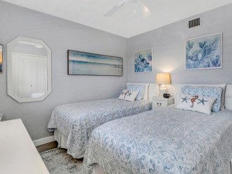 Guest room with 2 XL twin beds that can be made into a king bed upon request.