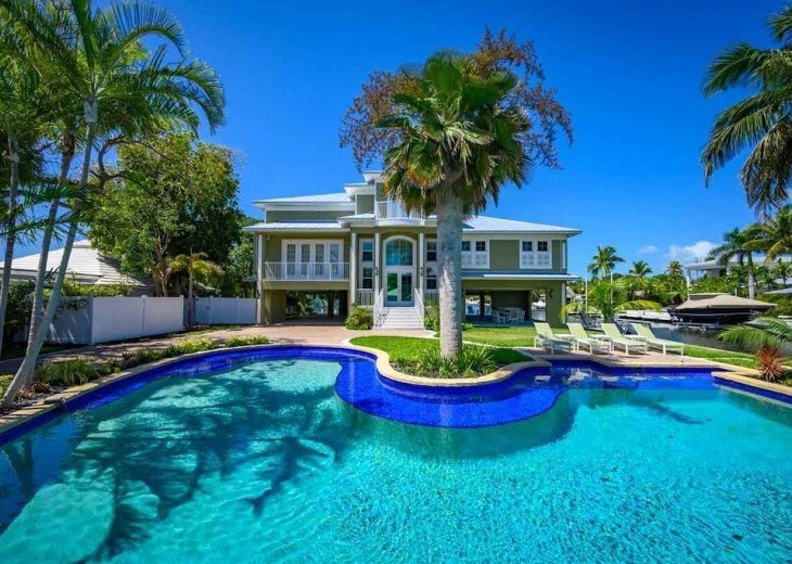 One of a kind Key West Waterfront Pool Home with boat lift and amazing amenities