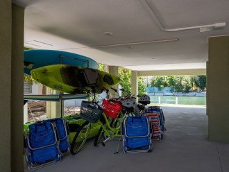 Kayaks, paddle boards, bikes with helmets and locks, beach chairs