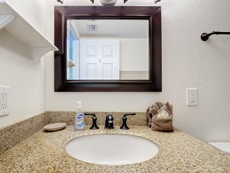 En suite bath with granite vanity