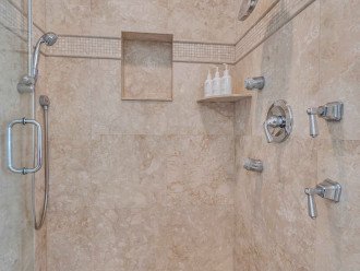 The Master shower is equipped with a rainfall shower head