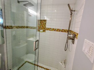 Shower heads work independently or at the same time.