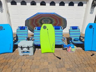 6 Beach Chairs, Umbrella, and Cooler For Perfect Beach Day