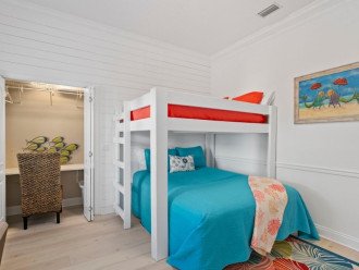The beautifully appointed bunk room features a Full over QUEEN Bed & a Work Station