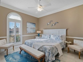 2nd Master Bedroom Features a King Bed with Large French Window & Extra Seating