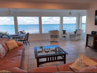 Open floor plan from the kitchen through the living room to the ocean view