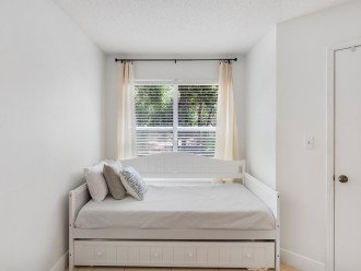 Day bed with trundle in master bedroom