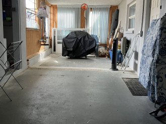 garage & storage shot from garage door - access to backyard (door on left),