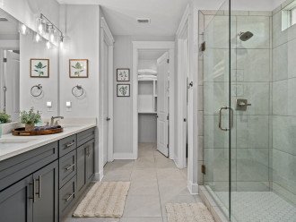 Master Bath with double vanity, oversized shower and large walk-in closet