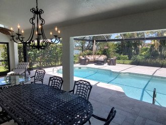 Outside Lanai with pool and dining area