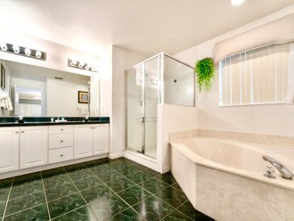Spacious bathroom with separate shower and bath