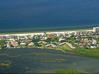 Arial View of Pelican Harbor Bay and Beach Across the Street