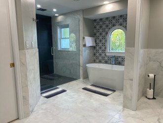 Master Bathroom- zero edge shower floor and bathtub.
