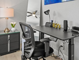 Dedicated workspace with sit/stand desk