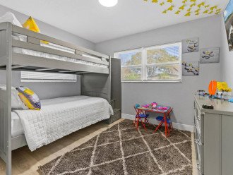 Fly away from the day to day with twin over twin bunks (Third bedroom)