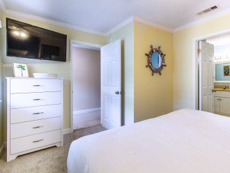 Master bedroom with TV and on suite bathroom