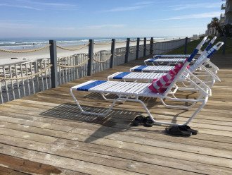 Relax on the sand or Sea Coast Garden's wooden boardwalk