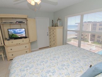Watch shuffle board games, see the sun rise or just relax watching your TV in this inviting room.